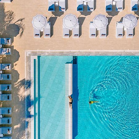 Ivi Mare - Designed For Adults By Louis Hotels Geroskipou Extérieur photo Aerial view of the pool at the Hotel du Cap-Eden-Roc, Cap d'Antibes, France